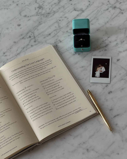 Life Designer Journal for Couples by Intelligent Change, open with pages for shared reflections and relationship goals.