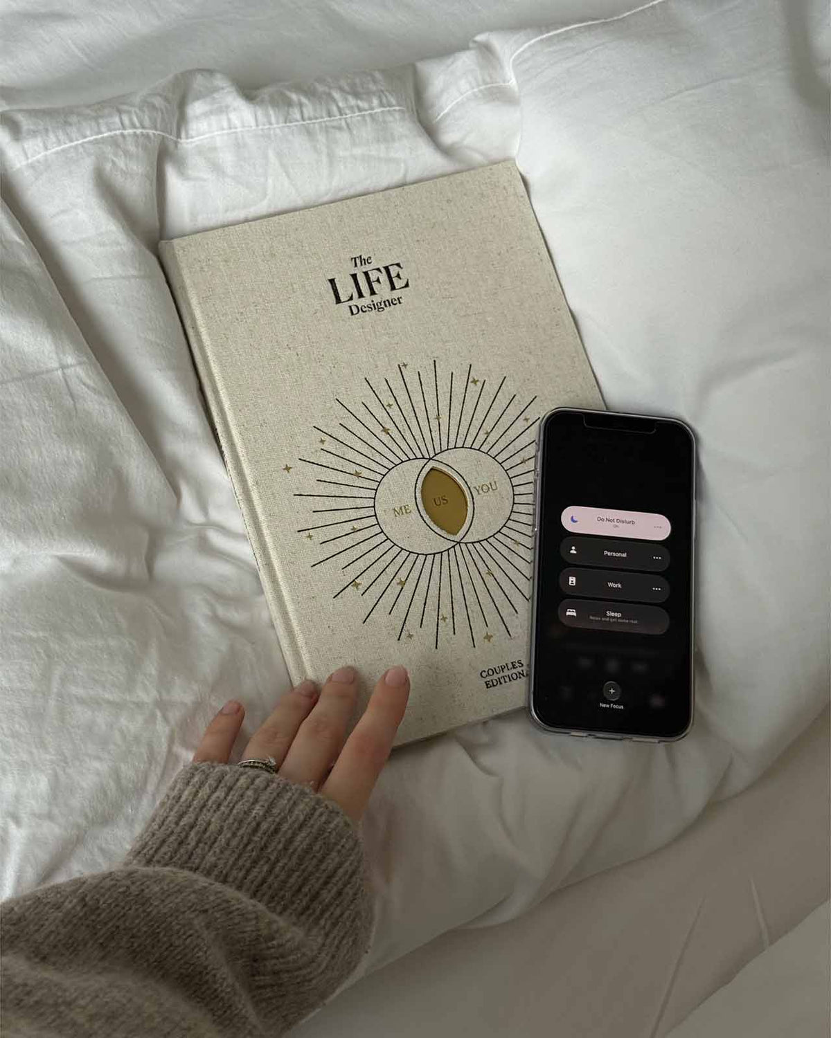 Life Designer Journal for Couples by Intelligent Change, featuring open pages with prompts for relationship reflection and planning.