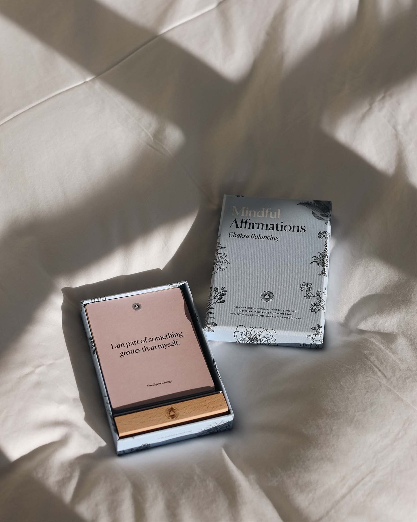 Mindful Affirmations card deck by Intelligent Change for chakra balancing, featuring colorful, calming designs and positive affirmations.