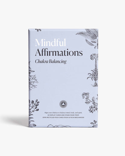 A set of mindful affirmations for chakra balancing by Intelligent Change, featuring calming text and chakra symbols on a serene background.