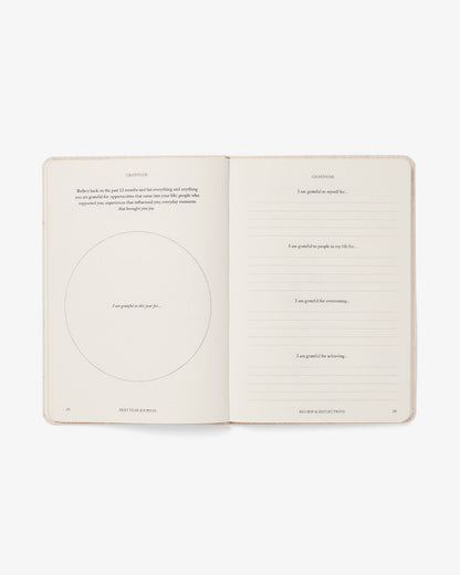 Green Best Year Journal Essential by Intelligent Change, a mindfulness journal with a clean design and motivational pages.