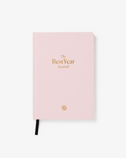 Pink Best Year Journal by Intelligent Change, a mindfulness journal with a soft cover and inspiring design for daily reflection.