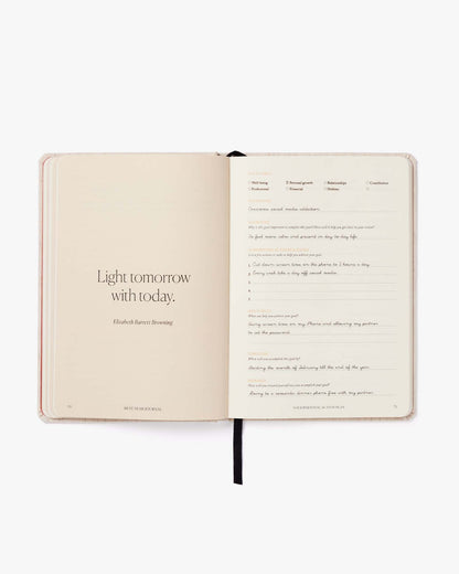 Pink Best Year Journal by Intelligent Change for mindfulness, featuring a soft pink cover and inspiring design for reflection.