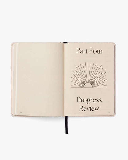 Pink Best Year Journal by Intelligent Change for mindfulness, featuring a soft cover and inspiring interior pages.