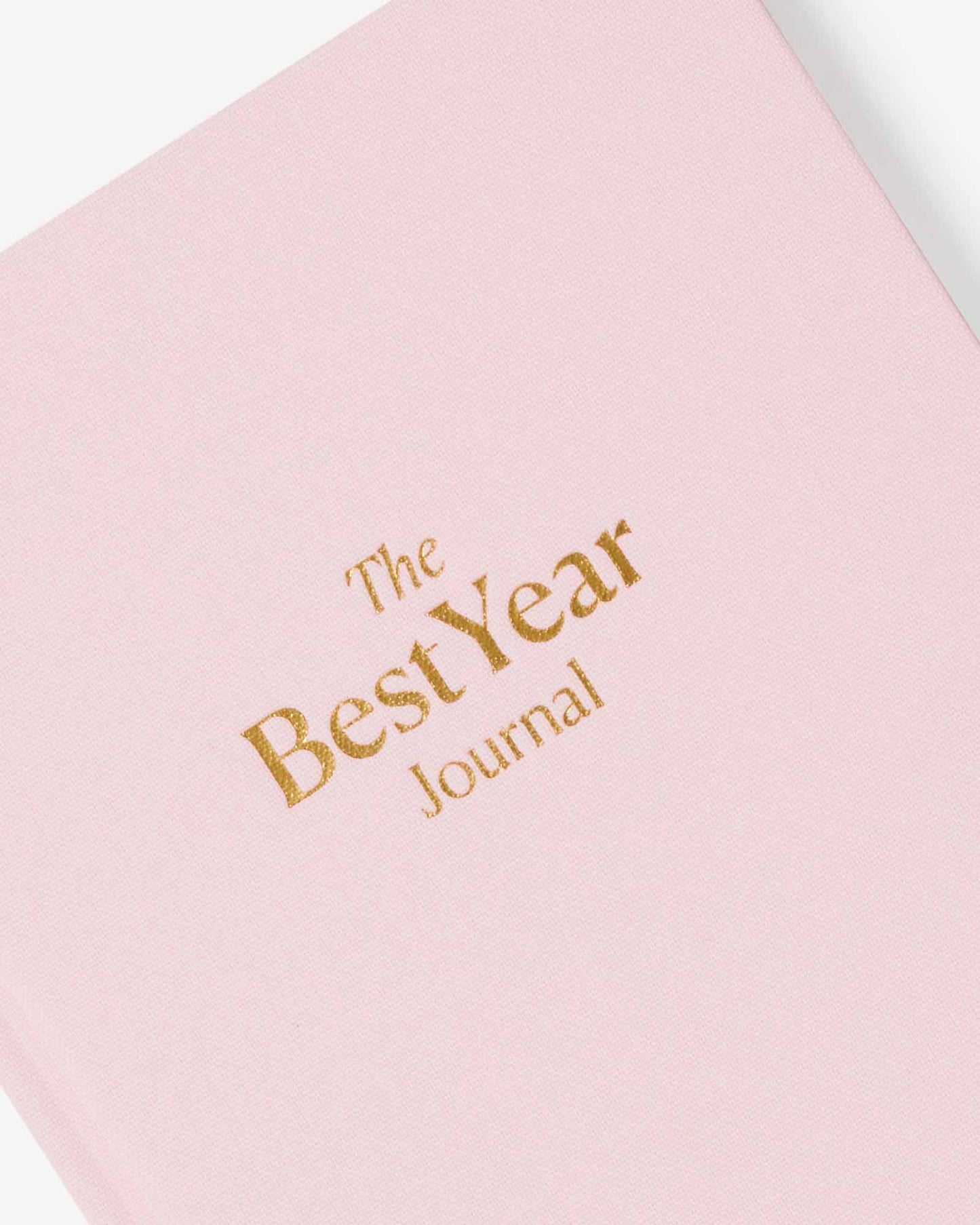 Pink Best Year Journal by Intelligent Change for mindfulness, with open pages for daily reflections and goal setting.