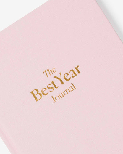 Pink Best Year Journal by Intelligent Change for mindfulness, with open pages for daily reflections and goal setting.