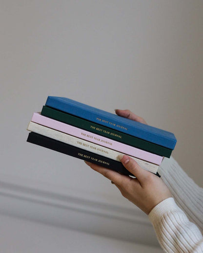 Pink Best Year Journal by Intelligent Change, a mindfulness journal with a soft cover and inspiring design for daily reflection.