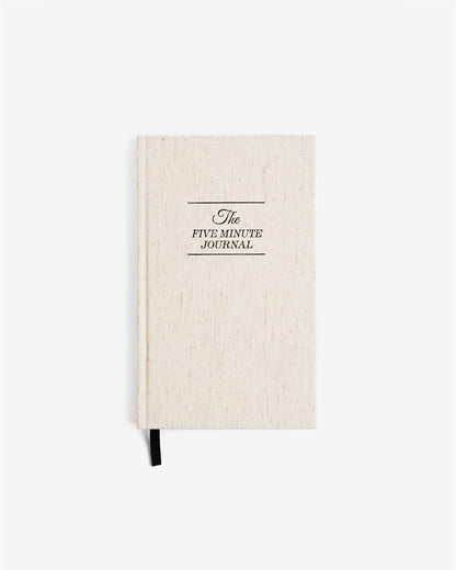 The Five Minute Journal Original Linen by Intelligent Change, mindfulness journal with a minimalist cover and lined pages inside.