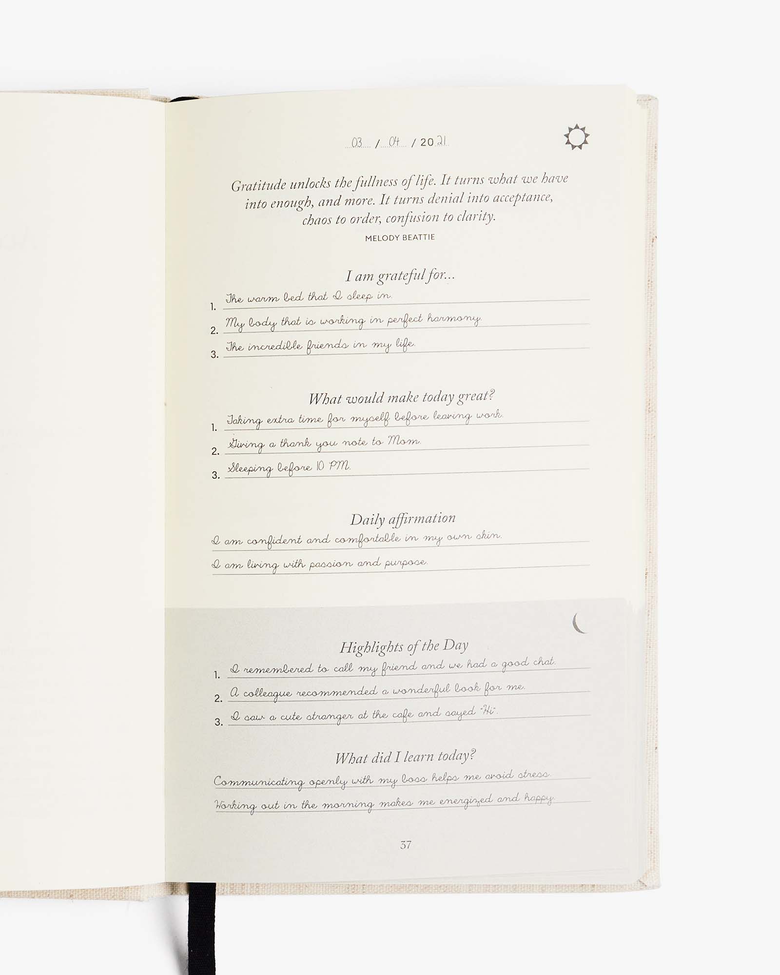 The Five Minute Journal original linen edition by Intelligent Change, a mindfulness journal with a soft linen cover and daily prompts.
