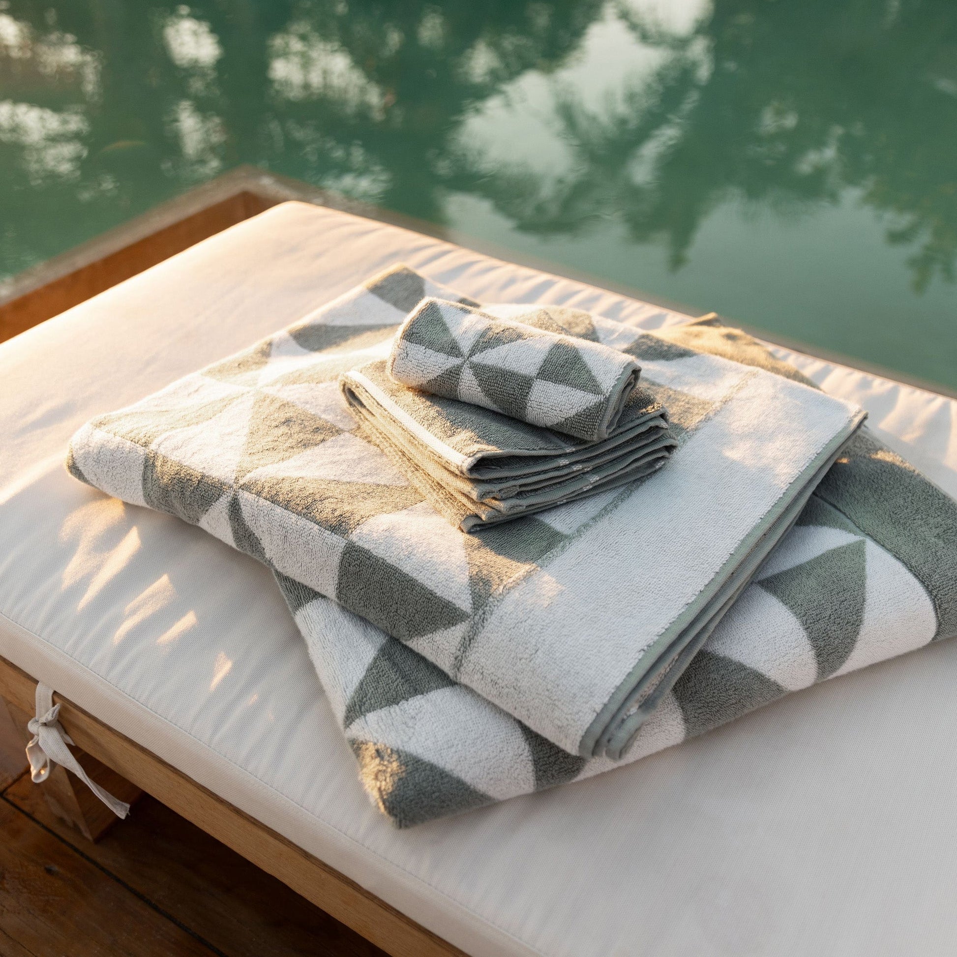 Set of two Italic Umbra Australian Cotton bath towels in sage and ecru, soft and plush for home bath use.