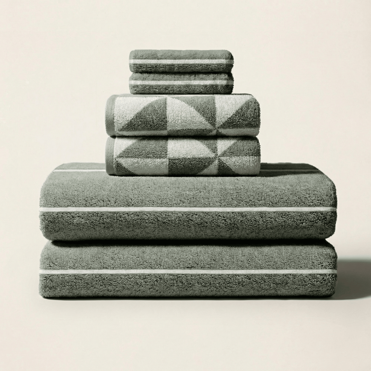 Set of two Italic Umbra Australian Cotton Bath Towels in sage and ecru, soft and plush for home bathroom use.