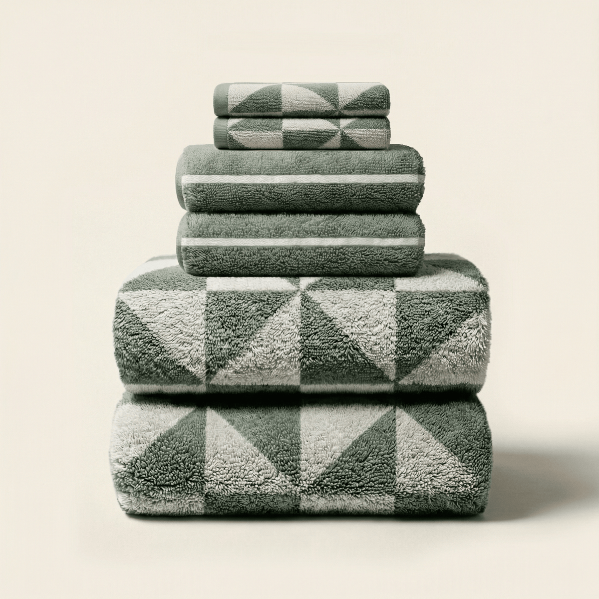 Set of two Italic Umbra Australian Cotton Bath Towels in sage and ecru, soft and plush for home bath use.
