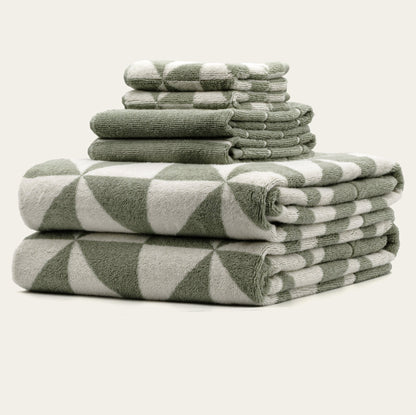 Set of two Italic Umbra Australian Cotton Bath Towels in sage and ecru, soft and plush for home use.