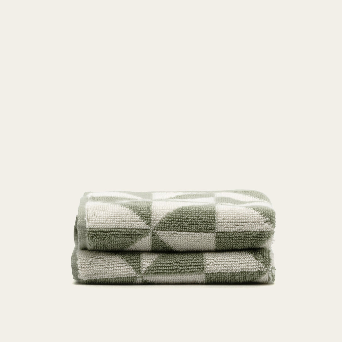 Set of two Italic Umbra Australian Cotton Bath Towels in sage and ecru, soft and plush for home bath use.