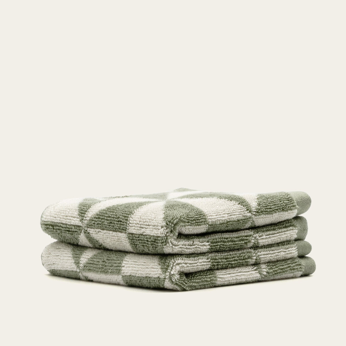Set of two Italic Umbra Australian Cotton bath washcloths in sage and ecru color, soft and absorbent home bath towels.