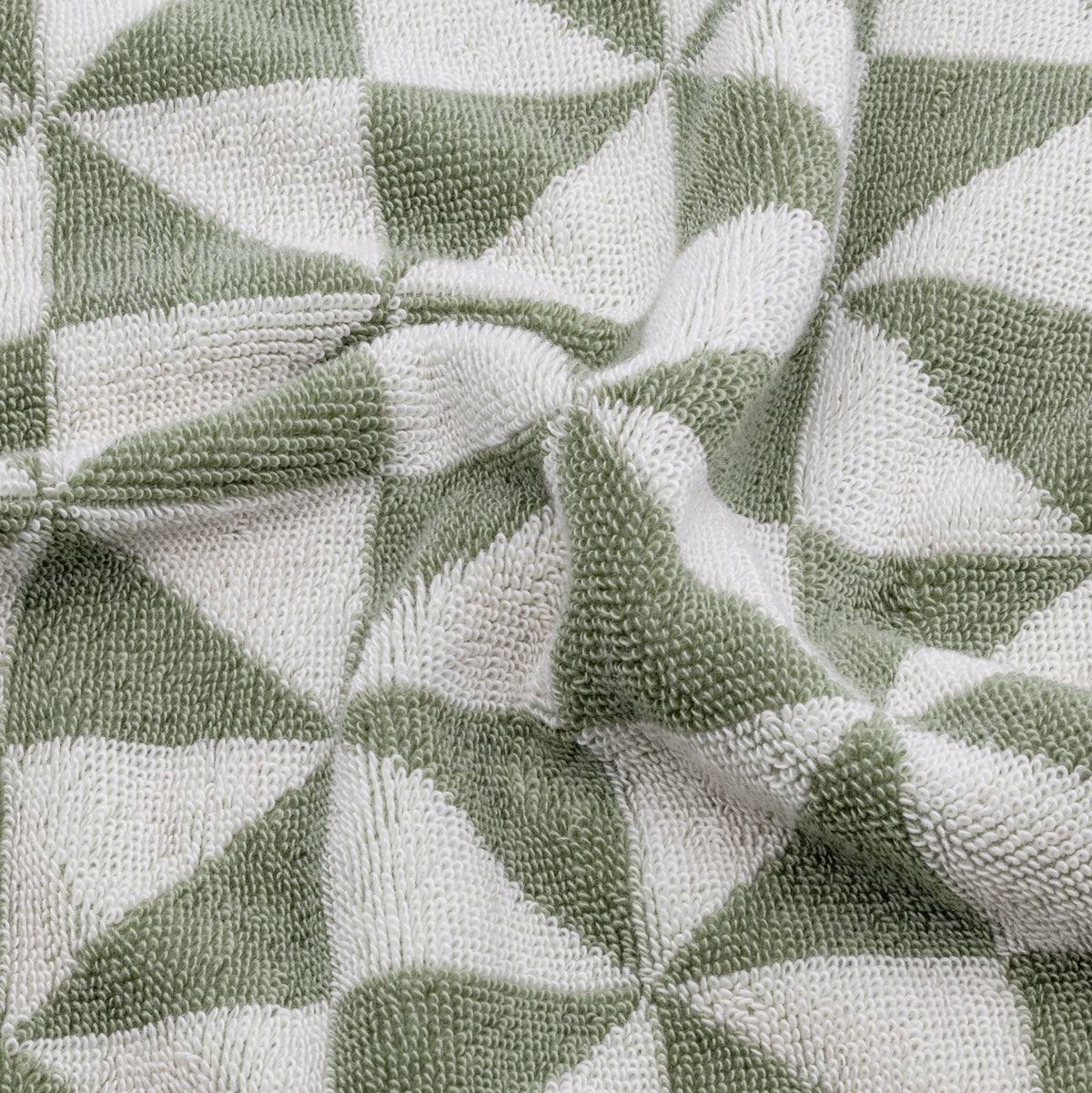 Set of two Italic Umbra Australian Cotton Towels in sage and ecru, soft and plush bath towels for home use.