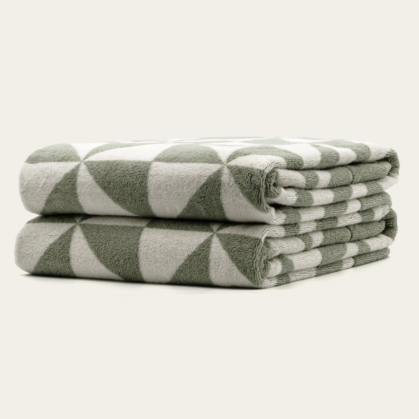 Set of two Italic Umbra Australian Cotton Bath Towels in sage and ecru, soft and plush for home bath use.