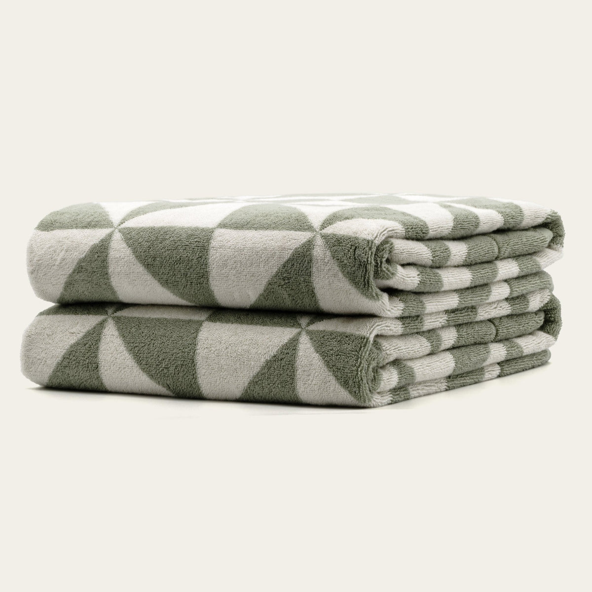Set of two Italic Umbra Australian Cotton Bath Towels in sage and ecru, soft and plush for home bath use.