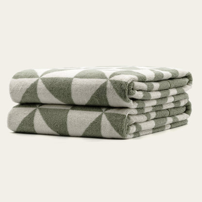 Set of two Italic Umbra Australian Cotton Bath Towels in sage and ecru, soft and plush for home bath use.