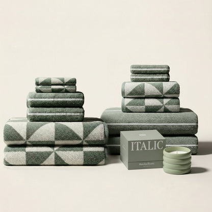 Set of two Italic Umbra Australian Cotton Bath Towels in sage and ecru, soft and plush for home use.