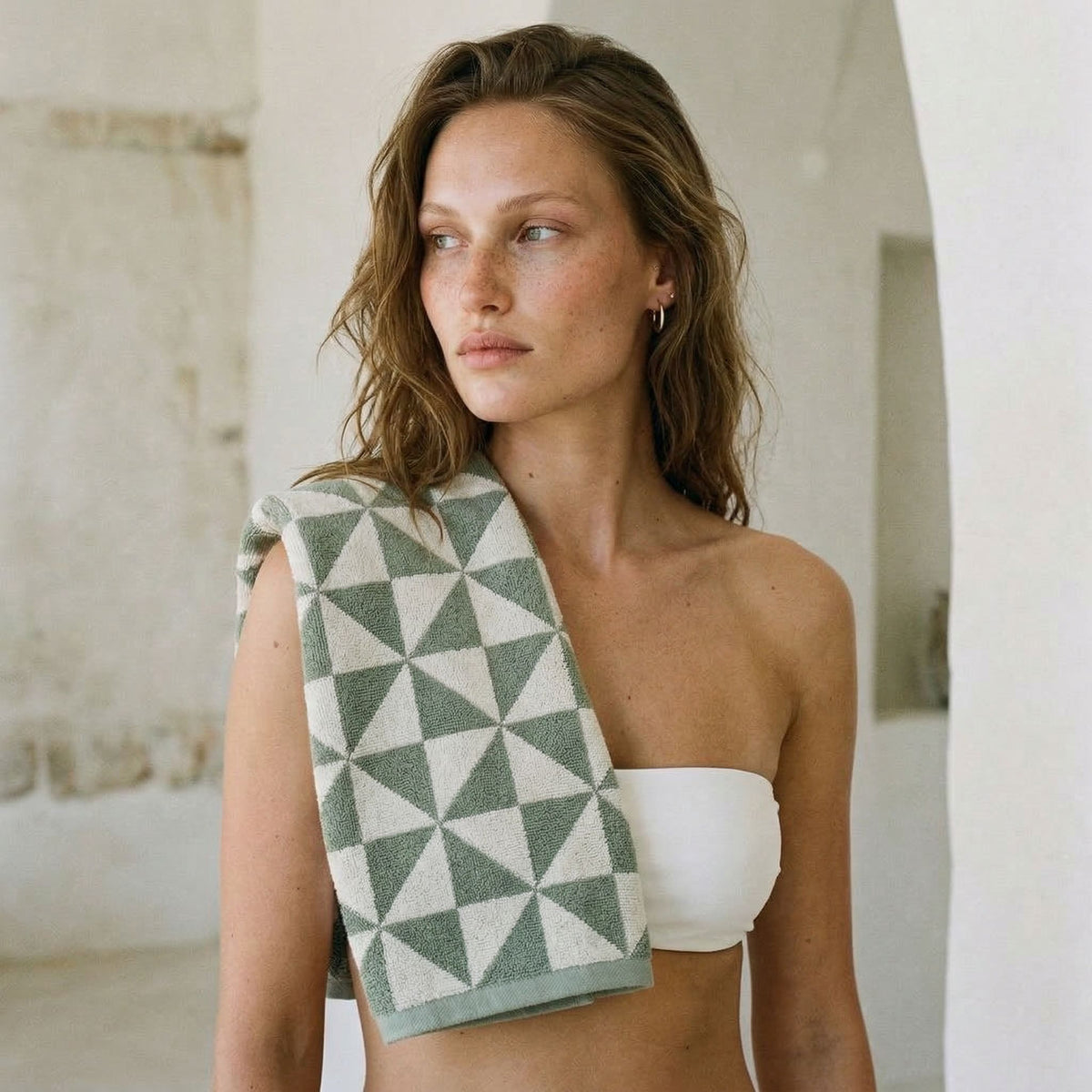 Set of two Italic Umbra Australian Cotton bath washcloths in sage and ecru, soft and absorbent home bath towels.
