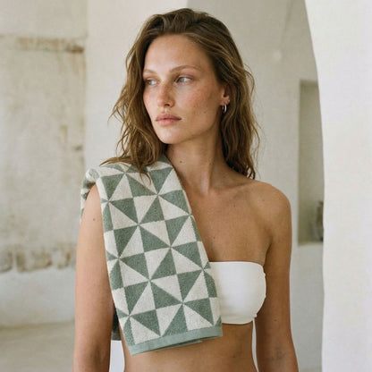 Set of two Italic Umbra Australian Cotton bath washcloths in sage and ecru, soft and absorbent home bath towels.