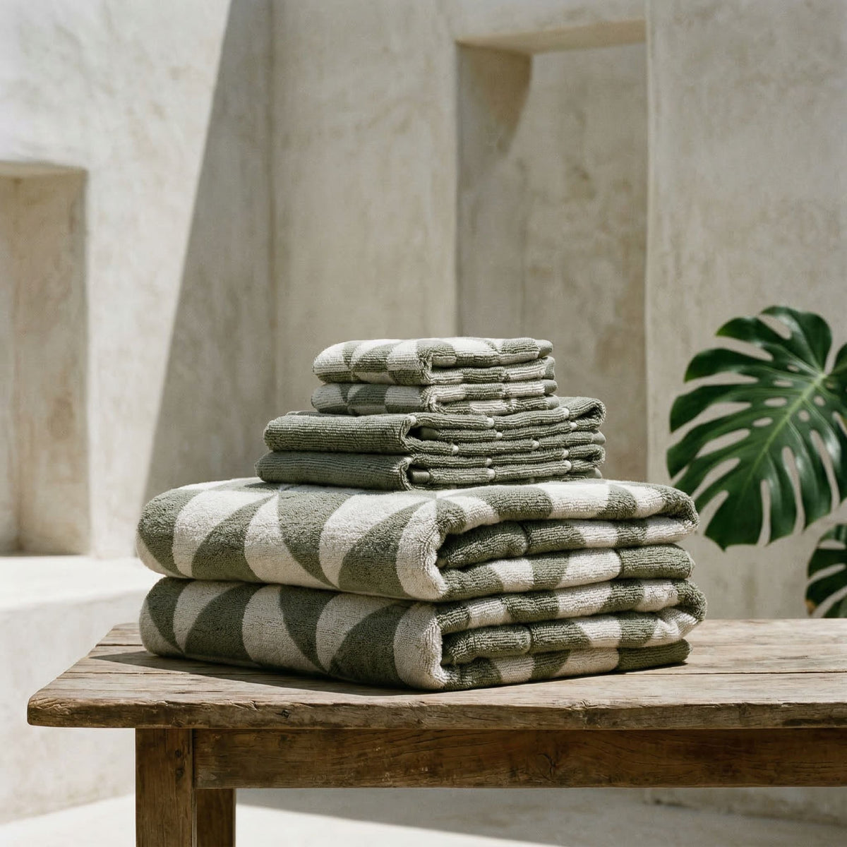 Set of two Italic Umbra Australian Cotton Bath Towels in sage and ecru, soft and plush for home bathroom use.