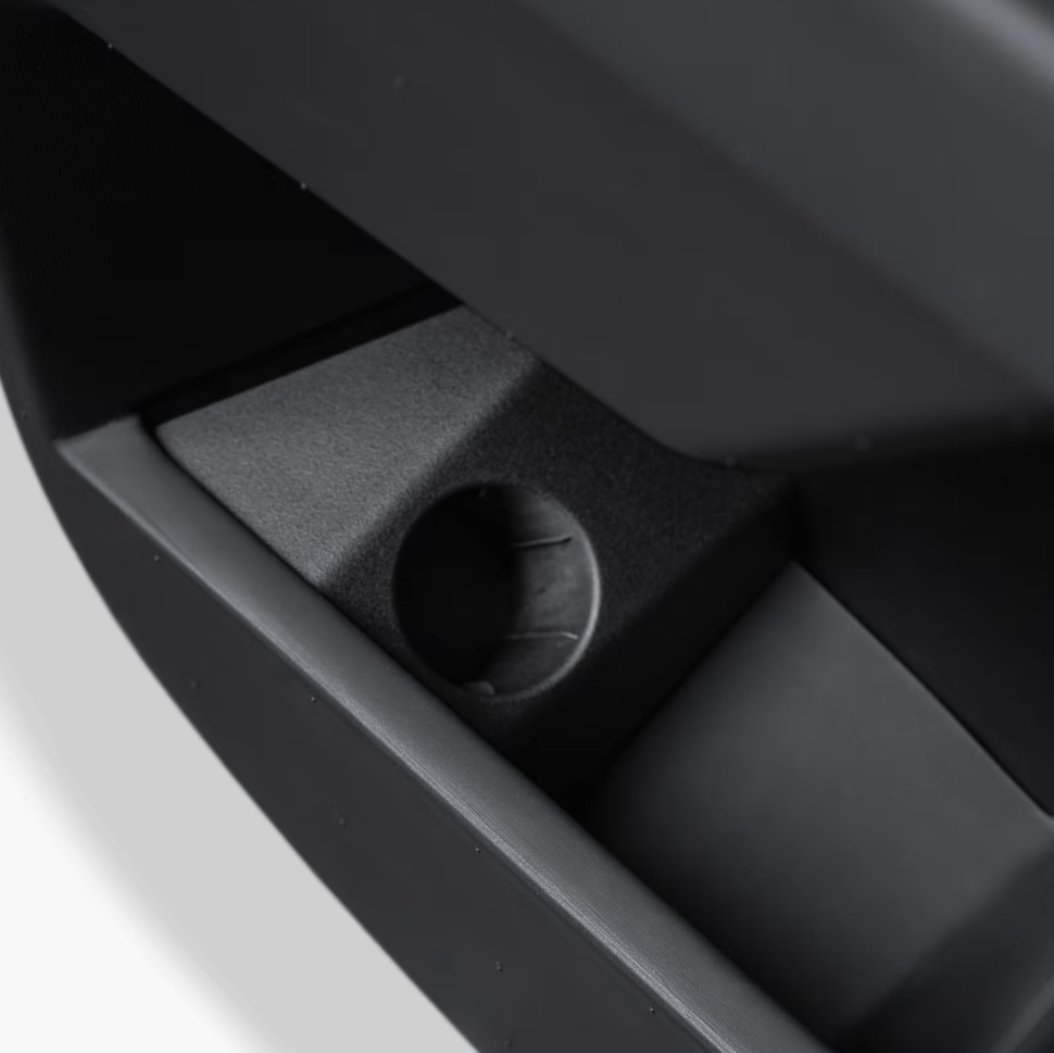 Tesla Cybertruck J1772 adapter door dock, compatible with charging stations, featuring a sleek design and easy access for charging.