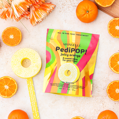 Spongellé PediPOP! Juicy Orange Pedi Buffer and Nail File for smooth, healthy toenails and foot care.