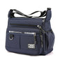 Black KAIGUANG Oxford shoulder bag with large capacity, multi-layer pockets, casual design, and single shoulder crossbody style.