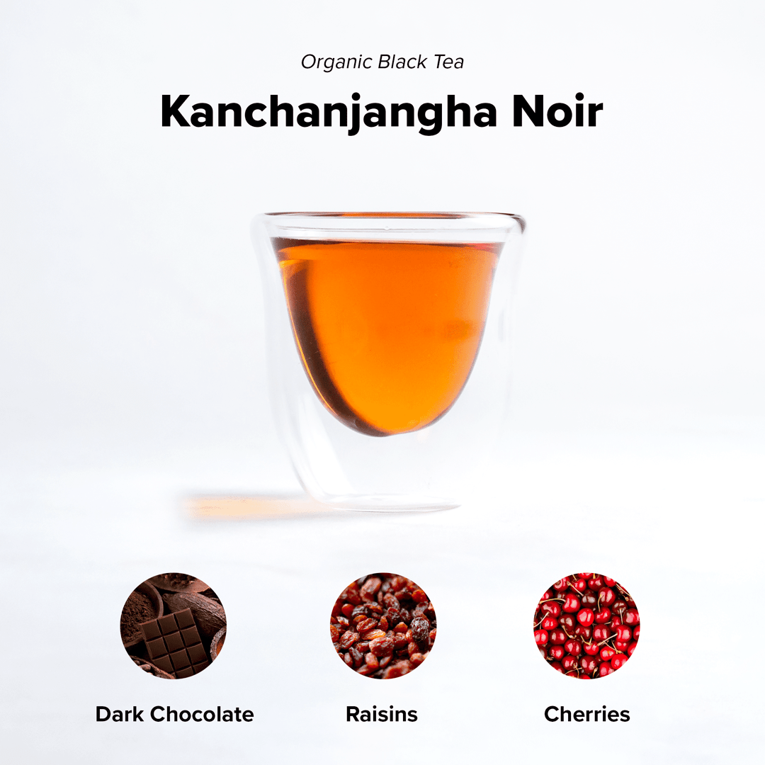 Organic Himalayan Sunrise Kanchanjangha Noir black tea leaves in a clear glass jar, showcasing the premium Nepal Tea product.