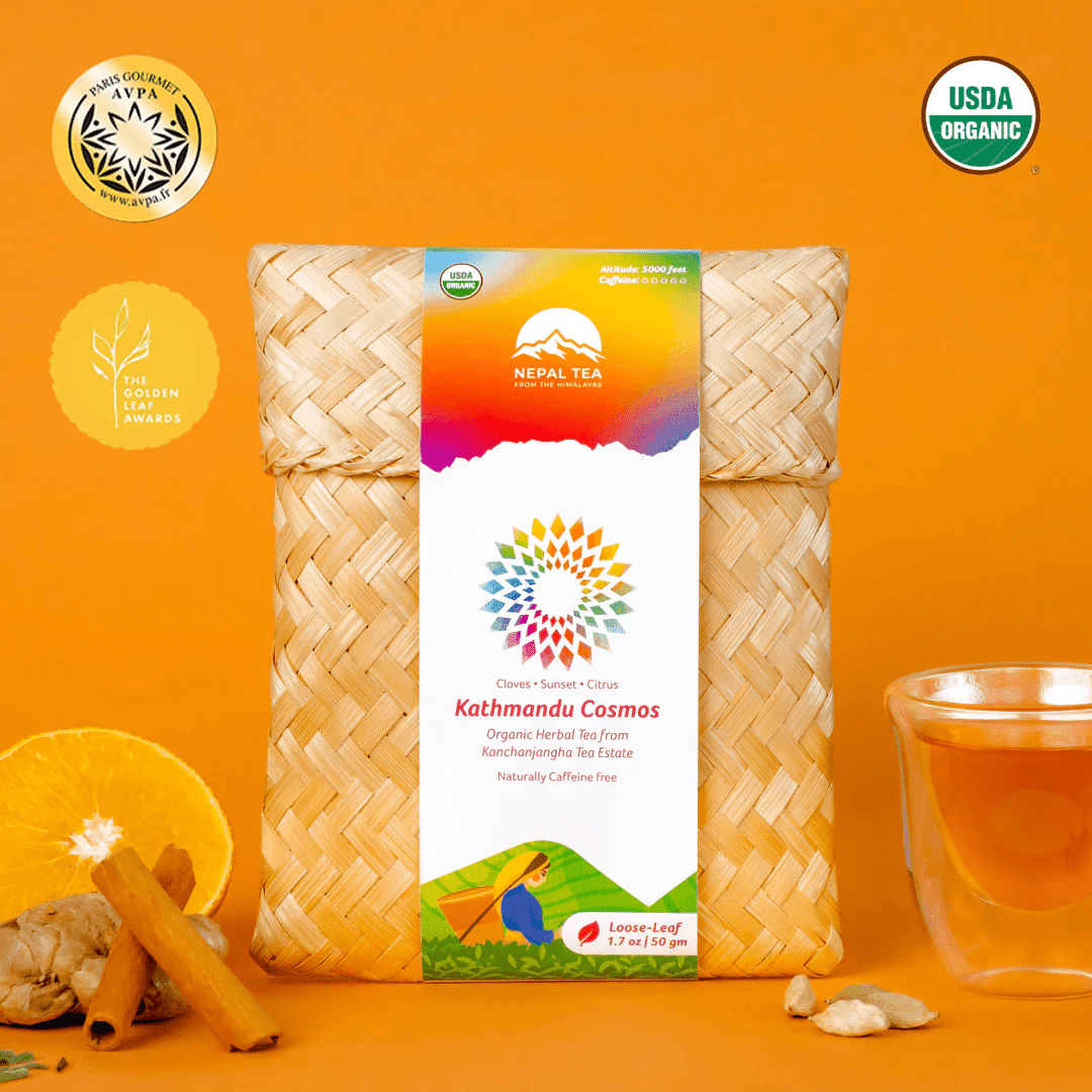 Organic Kathmandu Cosmos blend tea from Nepal Tea, showcasing a vibrant, colorful tea package with herbal ingredients.