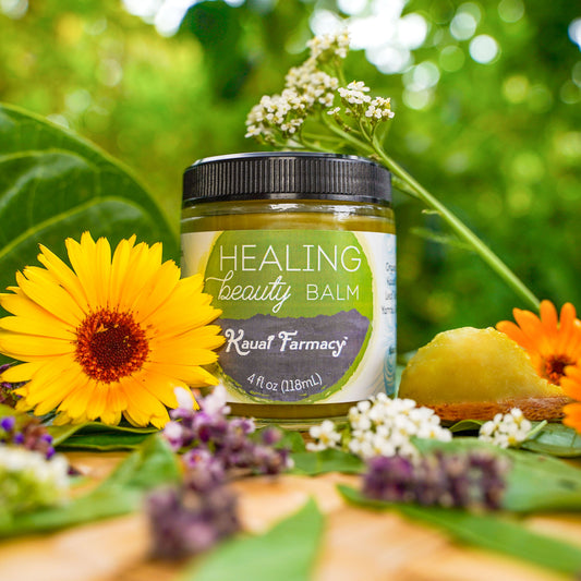 Kauai Farmacy Healing Beauty Balm salve in a 2oz jar, natural skincare product for soothing and nourishing skin.