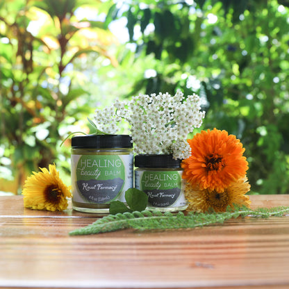 Kauai Farmacy Healing Beauty Balm salve in a 2oz tin, natural skincare product for skin healing and soothing.