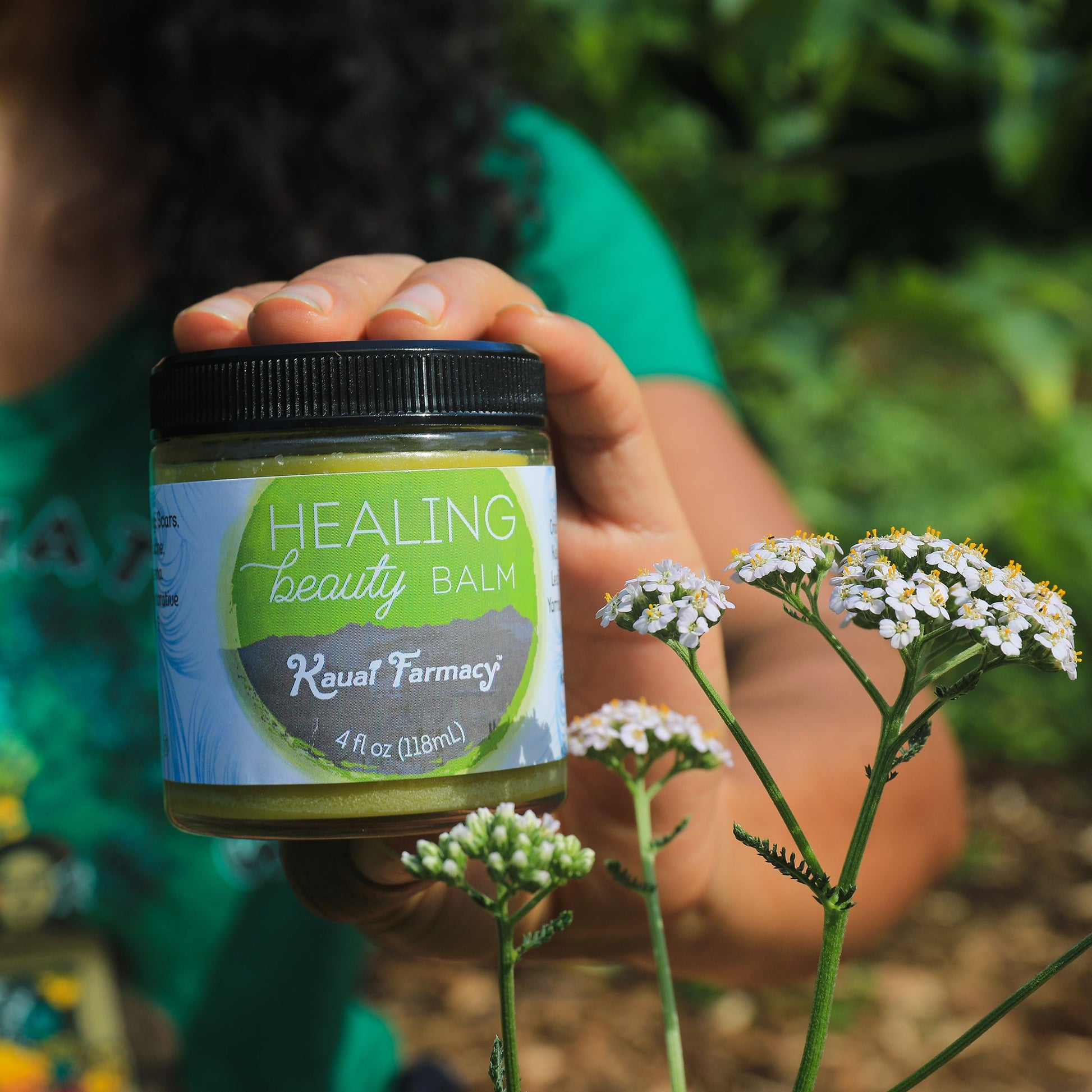 Kauai Farmacy Healing Beauty Balm salve in a 2oz jar, natural skincare product for skin soothing and healing.