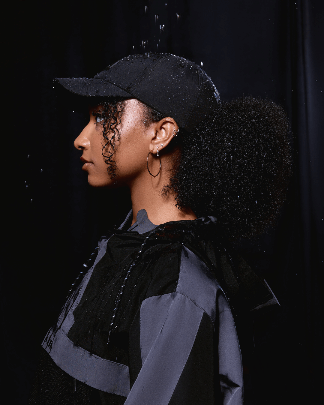 Black waterproof satin-lined dad hat by KINApparel, featuring a classic design with durable, water-resistant fabric and comfortable fit.