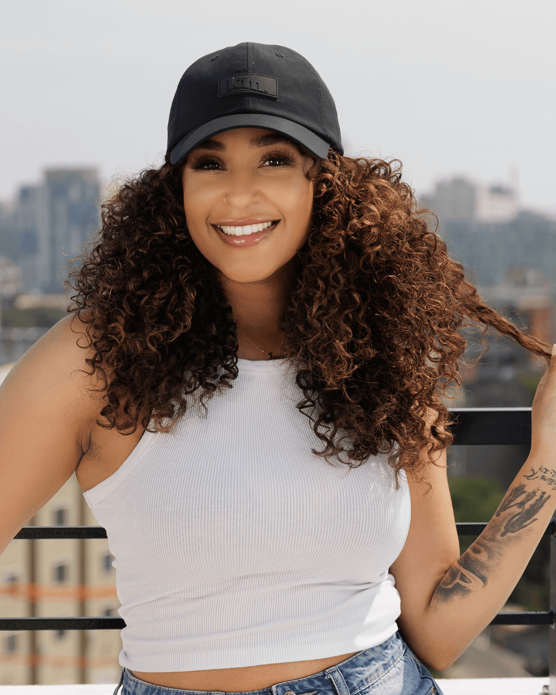 Black waterproof satin-lined dad hat by KINApparel, featuring a classic design and adjustable strap for comfortable fit.