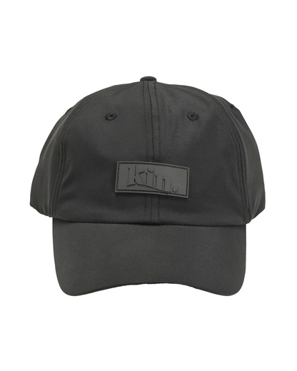 Black waterproof satin-lined dad hat by KINApparel, featuring a casual design with a curved brim and adjustable strap.