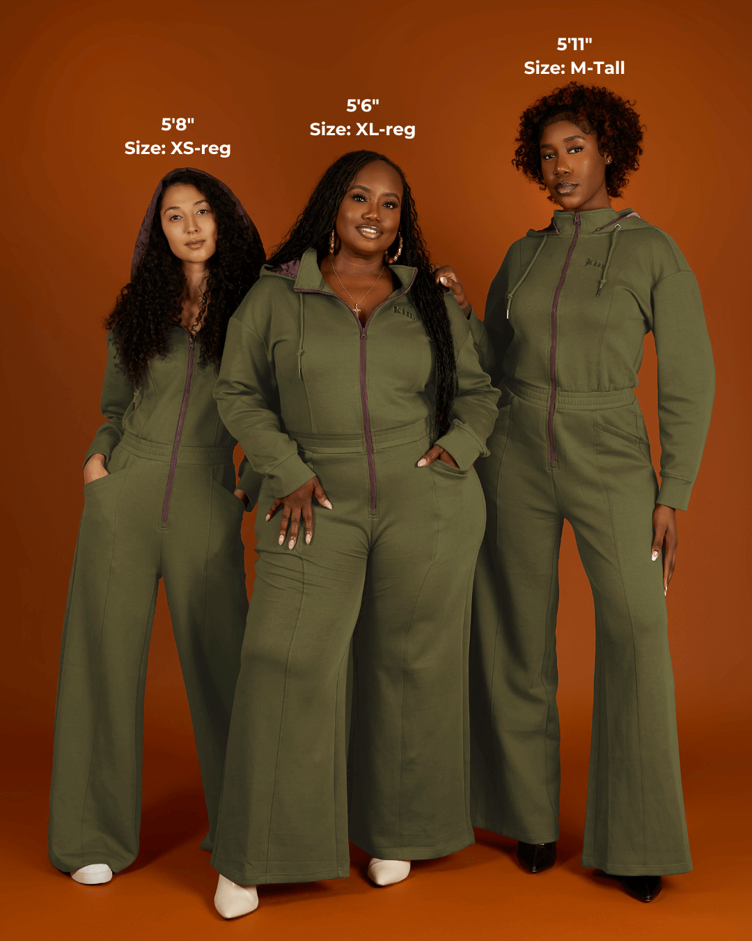 Green satin-lined jumpsuit by KINApparel, featuring a fitted design and long sleeves, styled on a model.