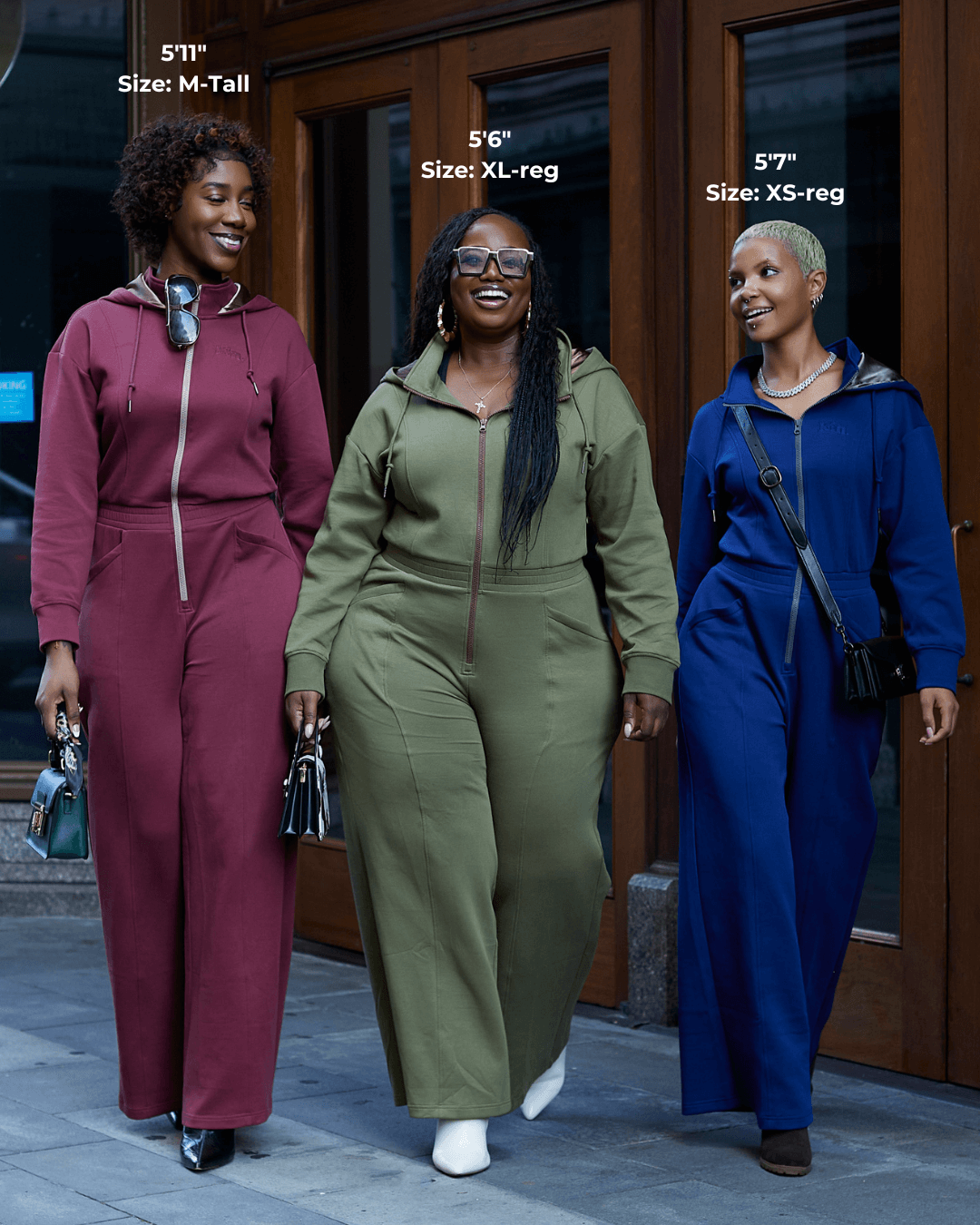 Green satin-lined jumpsuit by KINApparel, featuring a relaxed fit and stylish design, shown in a front view.