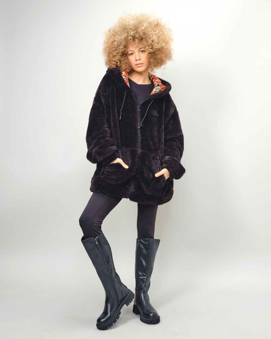 Black Kente thick teddy zip-up hoodie by KINApparel, satin-lined, cozy and warm with a stylish Kente pattern design.