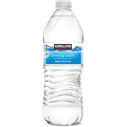 Kirkland Signature bottled water 16.9 fl oz, 40-count case stacked on a pallet, ready for bulk distribution.