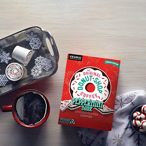 Cup of KupofK Coffee The Original Donut Shop Peppermint Bark K-cups, showcasing festive packaging and coffee pods.