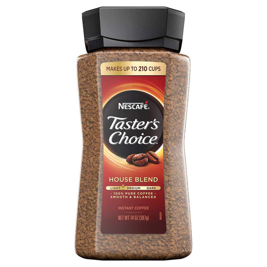 Cup of KupofK Coffee Nescafe Taster's Choice instant coffee with a spoon on a white background.
