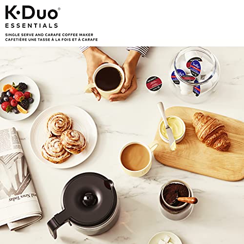 Keurig K-Duo Essentials coffee maker by KupofK Coffee with black finish, brewing single cups and full pots on a kitchen countertop.