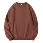 Loose beige cotton women's sweatshirt with O-neck and hood, casual pullover style, long sleeves, and solid color.