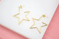 Large 18K gold-filled open star hoop earrings by MIA Jewelry, modern minimalist design with sleek, stylish metal hoops.