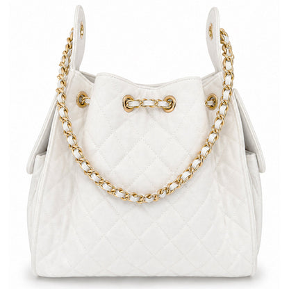BEACH HAUS Bayshore Medium Bucket Bag in white denim, showing the stylish round shape and textured fabric with leather strap details.