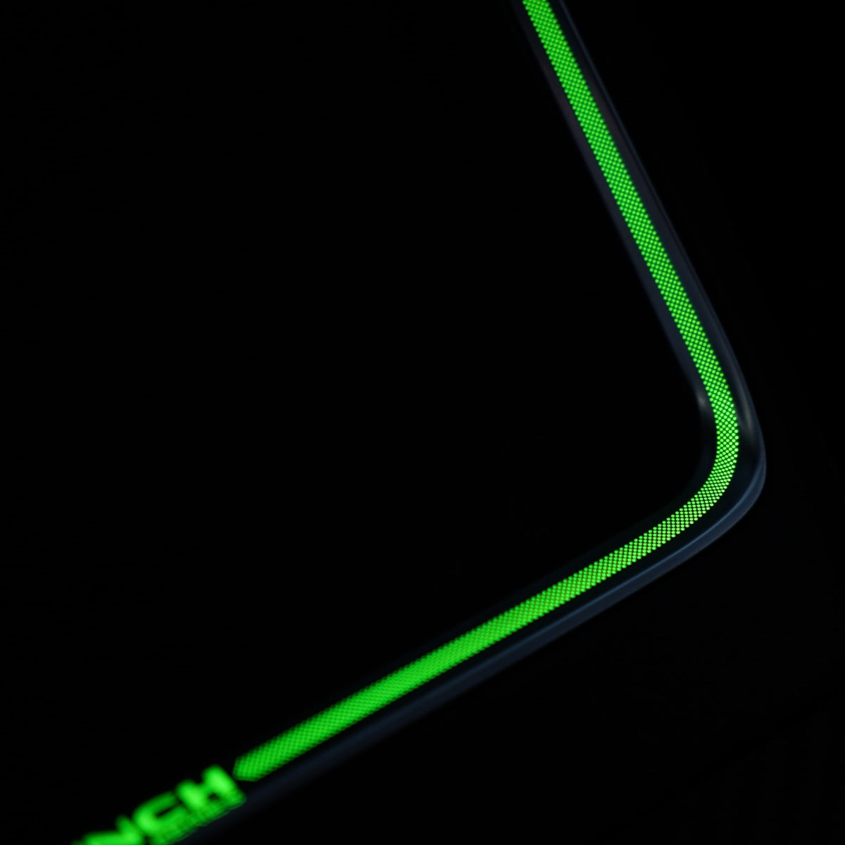 Laser-carved ambient light for Tesla Model Y Juniper wireless charging port by Tesery, enhancing interior lighting and style.