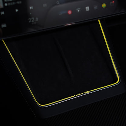 Laser-carved ambient light for Model Y Juniper with wireless charging port by Tesery, illuminating the interior with stylish LED lighting.